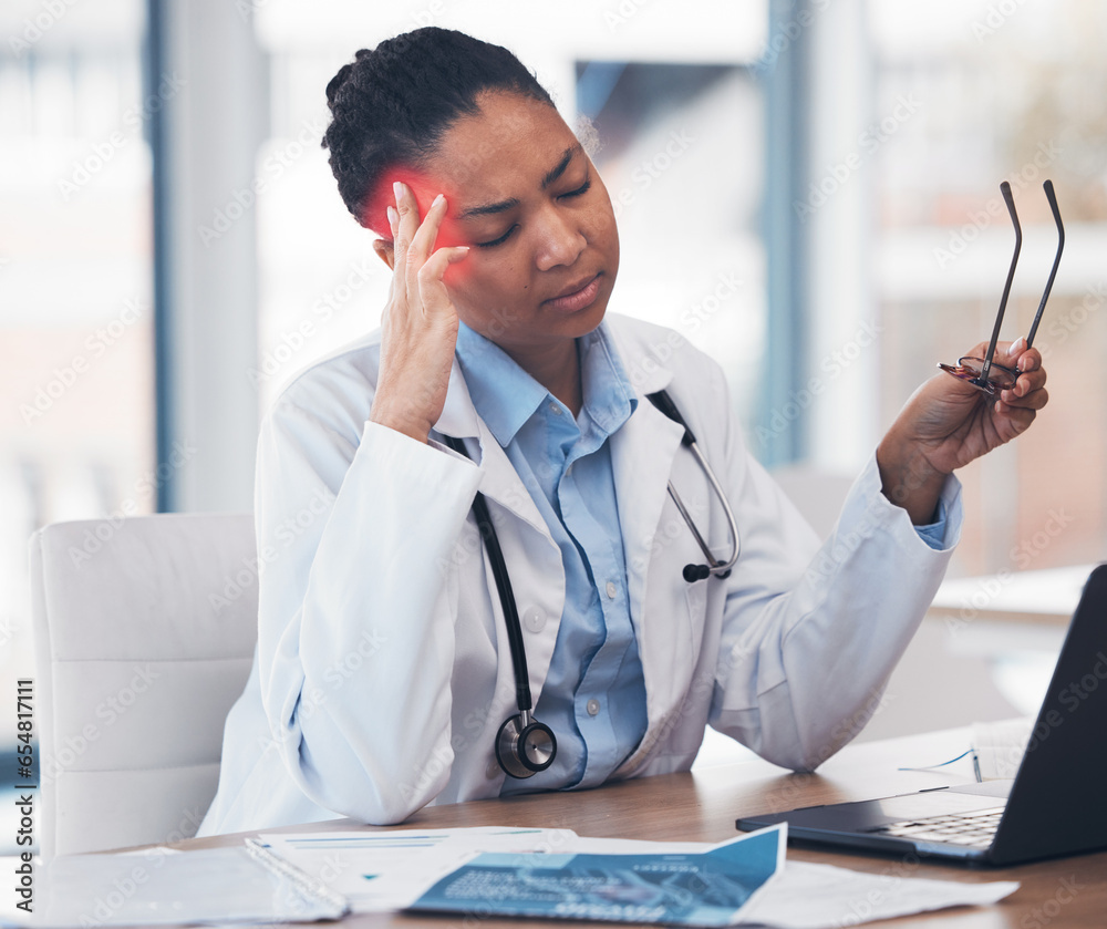 Woman, doctor or headache at desk or medicine burnout at hospital, mental health stress or tired. African female professional, fatigue or pain and working with brain fog depression, vertigo or sick