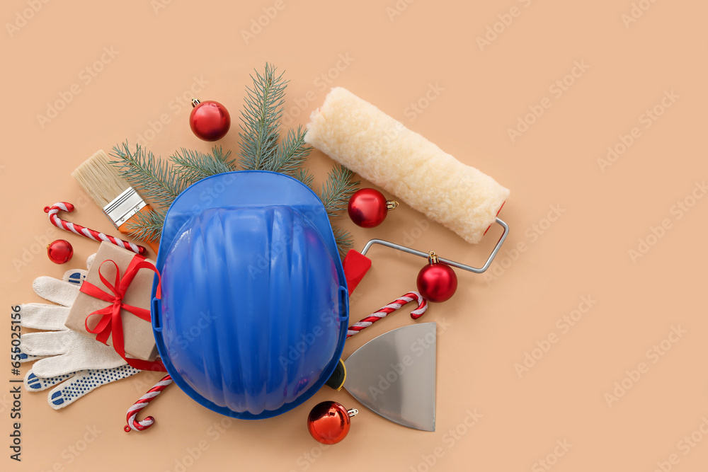 Decorators supplies with Christmas decor on beige background