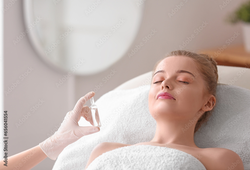 Young woman undergoing treatment in beauty salon. Skin care concept