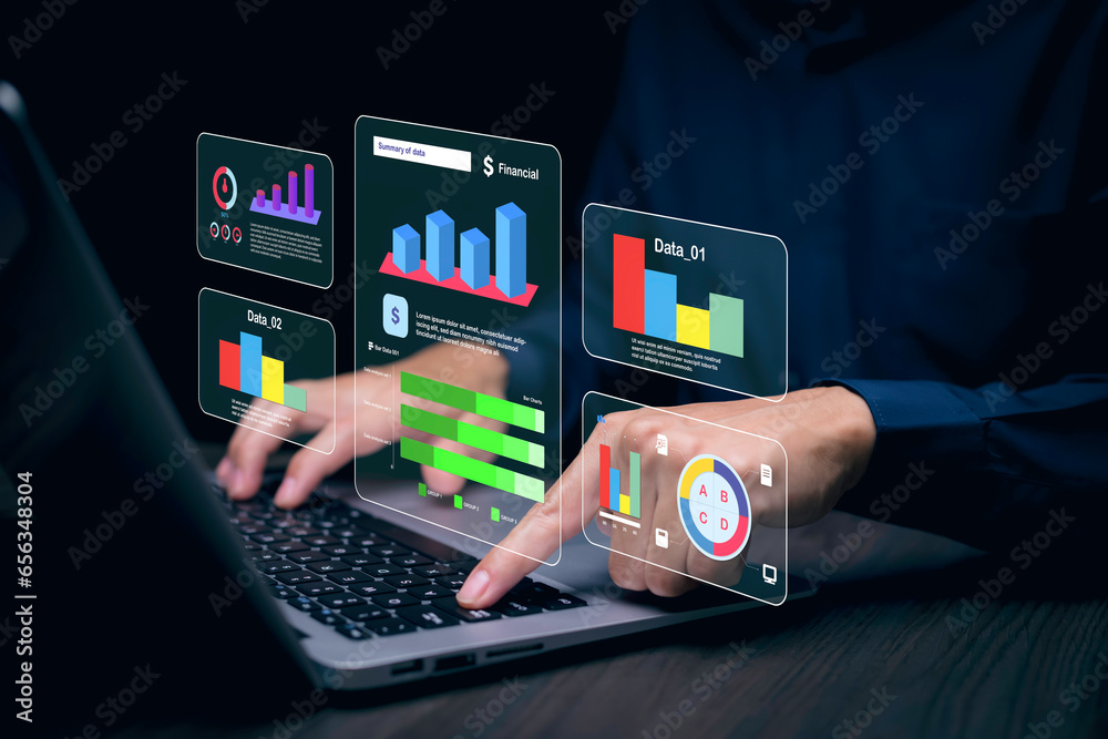 Businessman using a laptop with Analytics and Data Management Systems  Analyst working in Business Analytics and Data Management Systems to make reports and corporate strategy for finance, operations