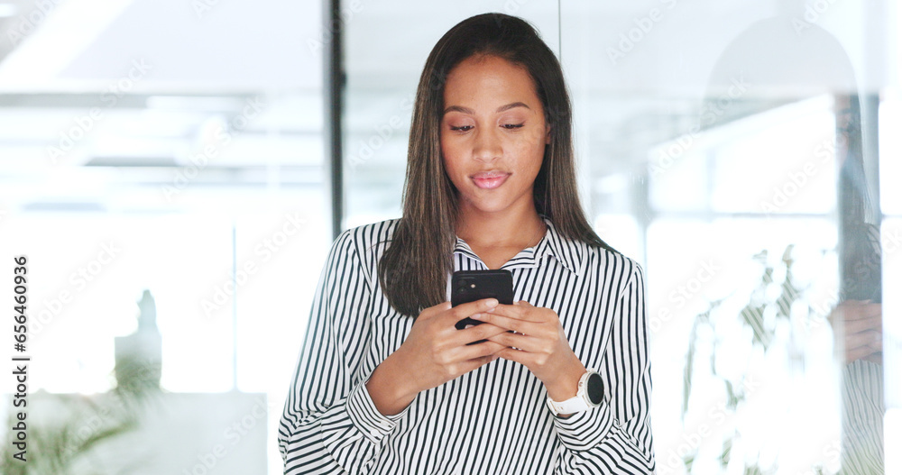 Business woman, phone and typing in office for social media marketing, online communication or reading news at agency. Professional african person on mobile chat, networking or search for opportunity