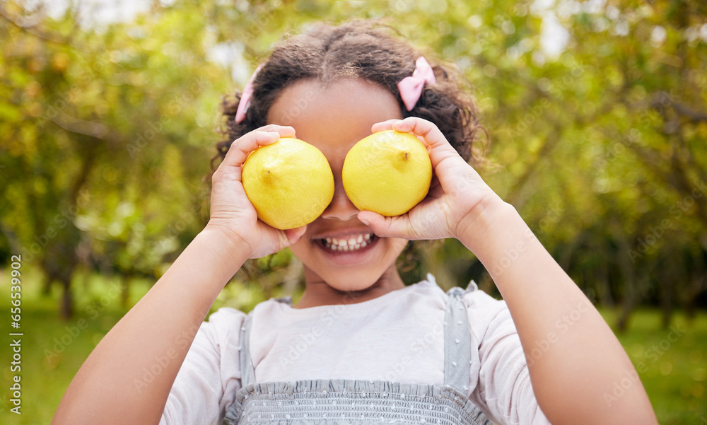 Lemon on eyes, smile and girl on farm for harvest, sustainable farming and growth in nature. Agriculture, childhood and happy kid with fruit for nutrition, healthy eating and organic food in garden