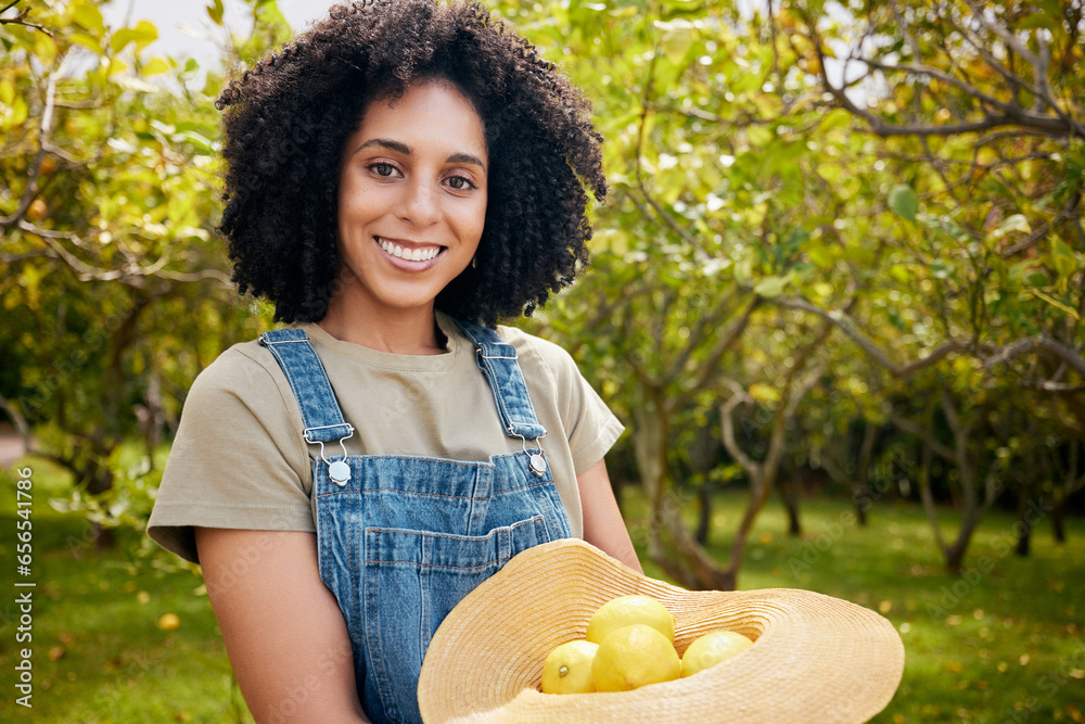 Woman in orchard, portrait and agriculture with lemon in nature, healthy food and nutrition with citrus farm outdoor. Farmer, picking fruit and smile with harvest, sustainability and organic product