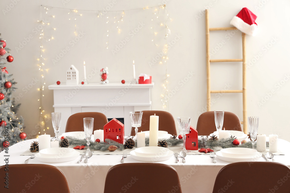 Festive table setting with Christmas decor at home