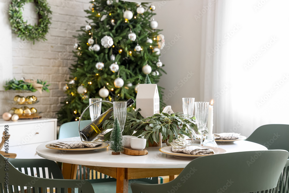 Festive table setting with Christmas decor at home