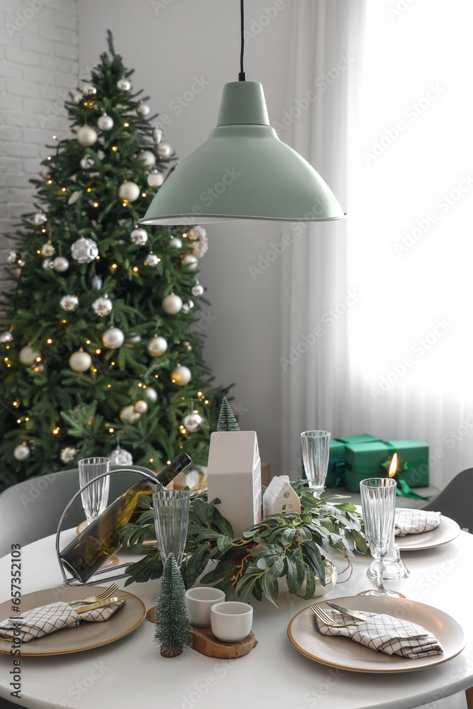 Festive table setting with Christmas decor at home