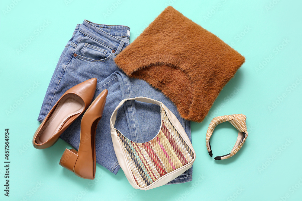 Composition with stylish female clothes, shoes and accessories on color background