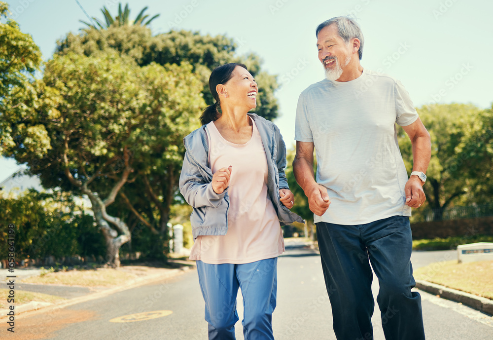 Happy mature couple, running exercise and fitness workout together in street of neighborhood. Asian man, woman and smile in road for healthy cardio performance, action and energy in morning outdoor