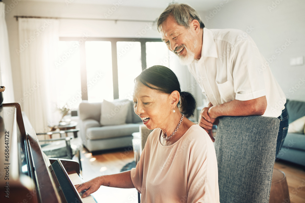 Piano, music and a senior asian couple in their home together for love or romance in retirement. Smile, art or creative with a happy elderly man and woman playing an instrument in their house