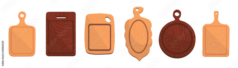 Set of different wooden cutting boards on white background