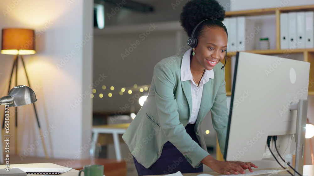 African woman, call center and typing in office with microphone, night or telemarketing with contact us. Consultant, crm and tech support agent with customer service, pc and reading at help desk