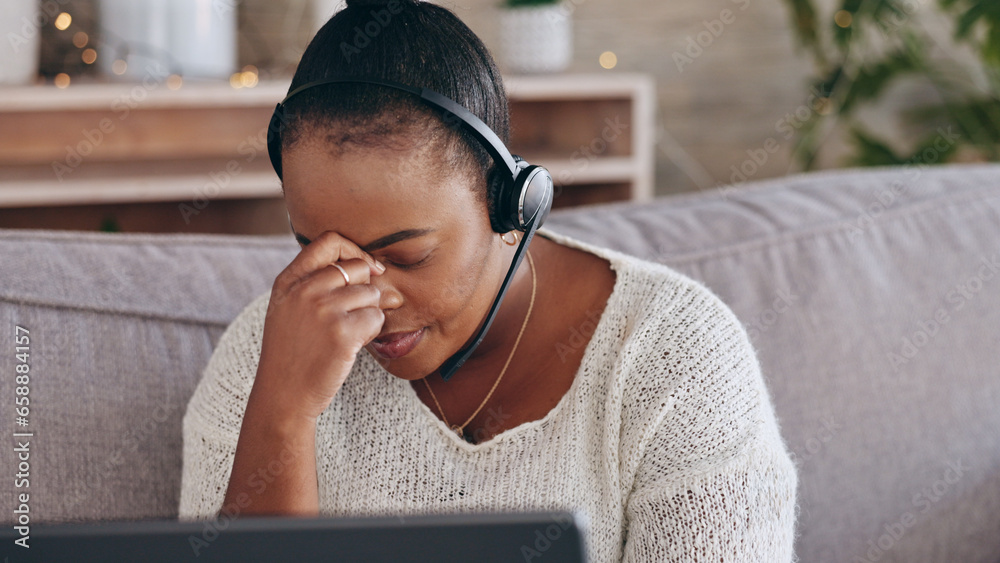 Stress, customer support and remote work with a black woman consultant on a sofa in the living room of her home. Depression, headache and an unhappy employee problem solving for help or assistance