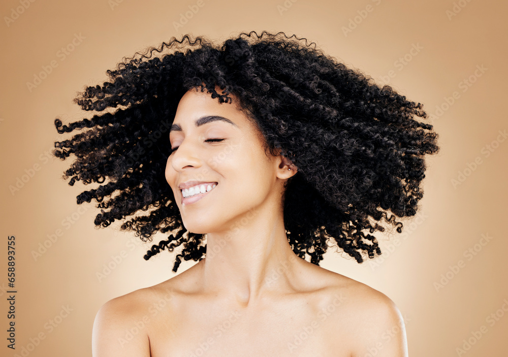 Woman, curly or hair shake in afro fun on studio background for healthy hairstyle growth, texture or frizz treatment success. African beauty model, energy or change by shampoo transformation results