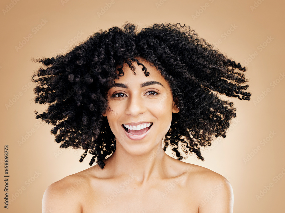 Model, curly and hair wind in afro fun on studio background for healthy hairstyle growth, texture or frizz treatment. African beauty woman, portrait and shake change by shampoo transformation results