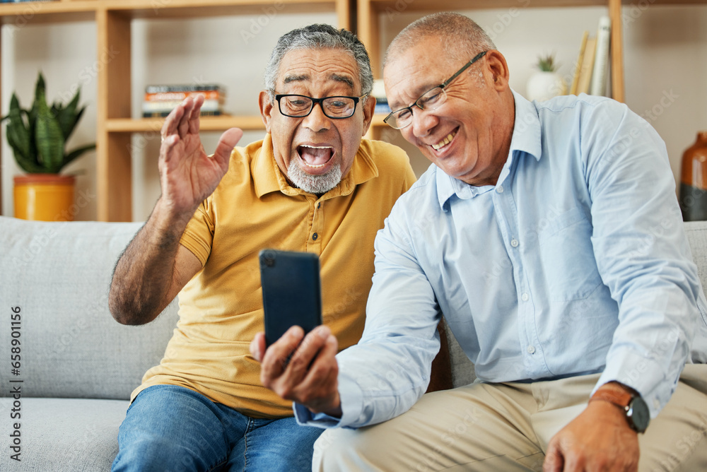 Friends, video call and senior men on sofa smile for talking, profile picture and chat at home. Retirement, wave and mature people on smartphone for internet, social media and bonding in living room