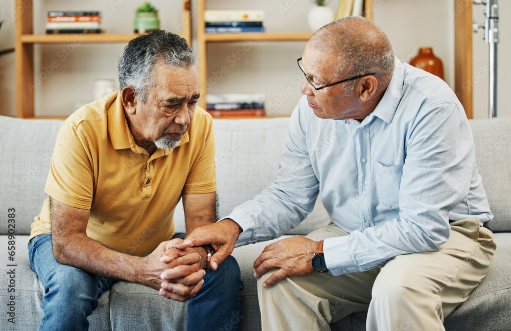 Men, sofa and support with friends in communication, hand gesture and grief with pain or loneliness. Elderly men, diversity and conversation on mental health or emotional counselling on sad with loss