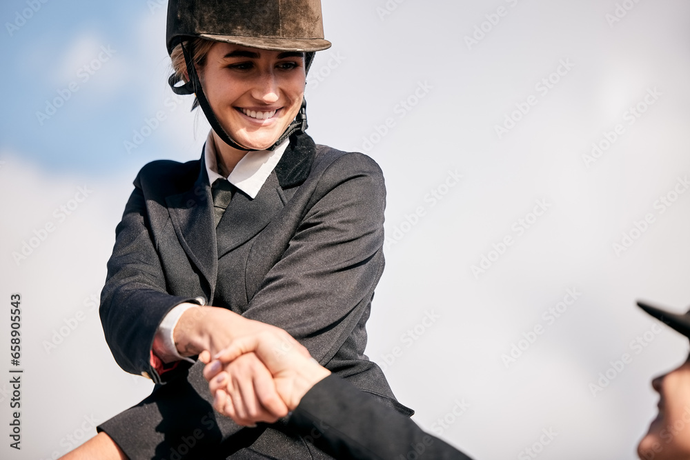 Handshake, equestrian and woman on horseback with her coach outdoor for training or practice. Smile, thank you or support with a happy young rider and teacher shaking hands for success or motivation