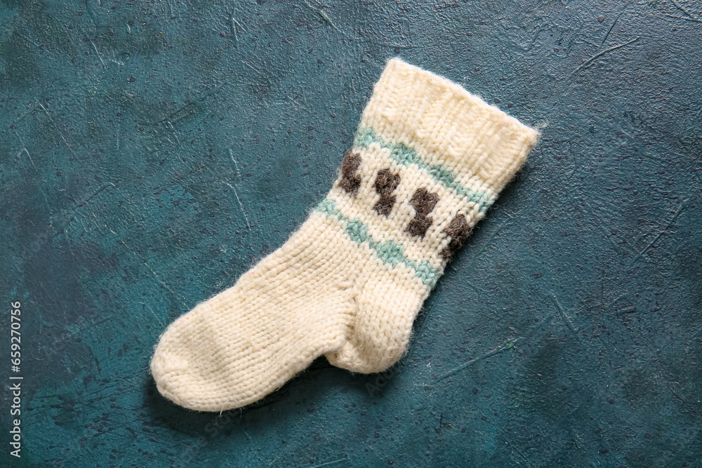 Christmas sock on blue background