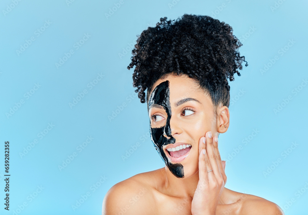 Mockup, charcoal mask and face of happy woman for facial treatment, anti aging and wellness in studio. Beauty, salon and person for healthy skin, cosmetics and grooming on blue background space