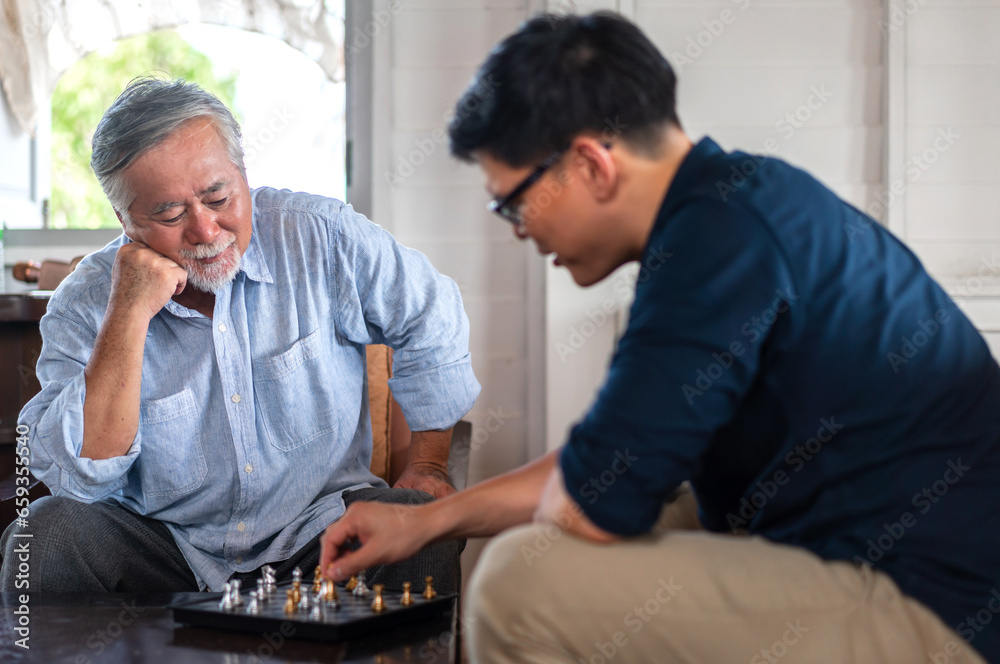 Portrait of enjoy happy love asian family senior mature father and young son smiling play laughing and having fun together at home, man, care, elderly, insurance.happy family, Father Day concept