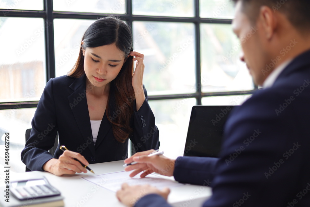 Manager reading resume while interviewing new employee candidates in office, job interview.