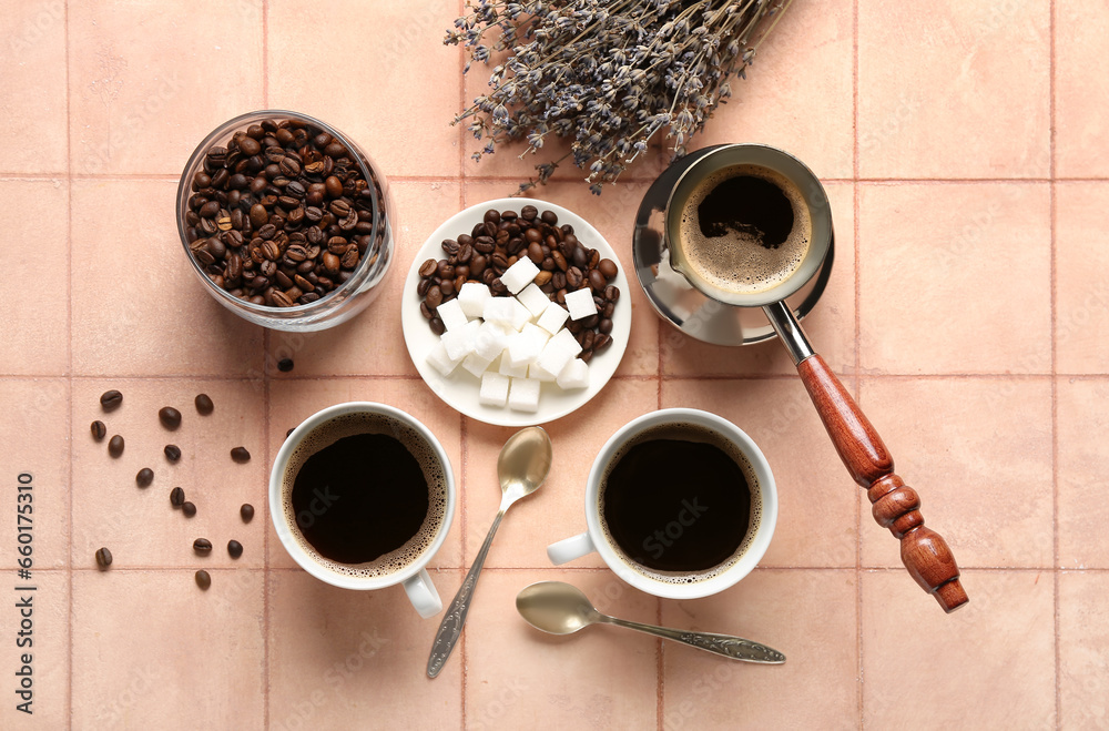 Composition with cups of coffee, beans and sugar cubes on beige tile background