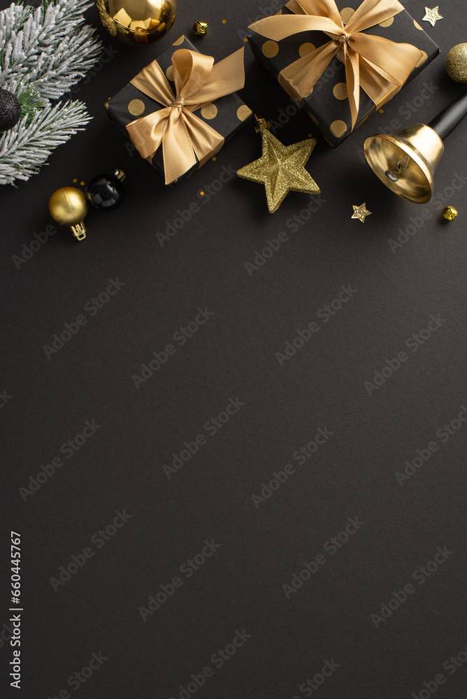 Deluxe Noel blessings inspiration. Overhead vertical view of opulent present boxes, extravagant tree decorations, confetti, ringing bell, frost-covered fir branch on background with space for greeting