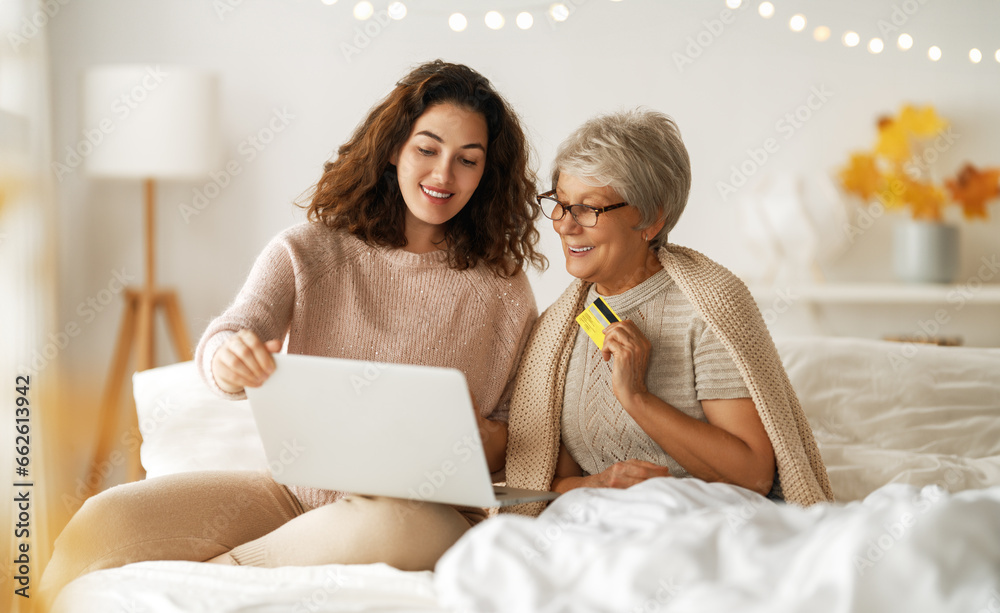 women are using laptop for online shopping