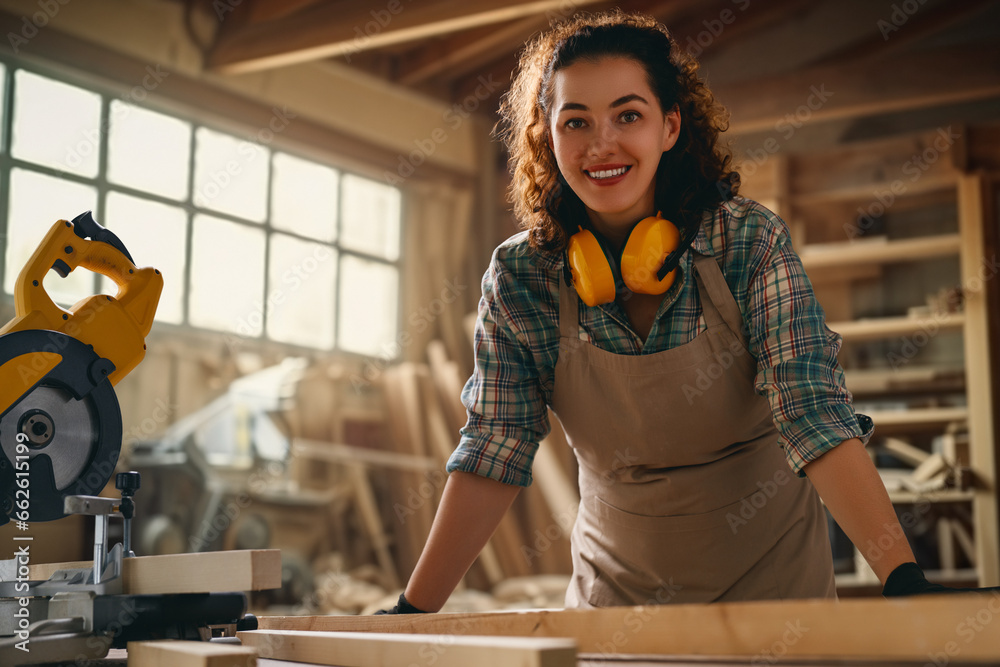 carpenter is working in workshop