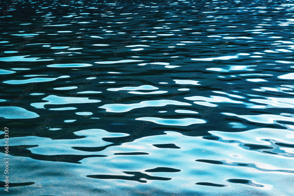 Lake Bohinj water surface, ripple pattern as natural background