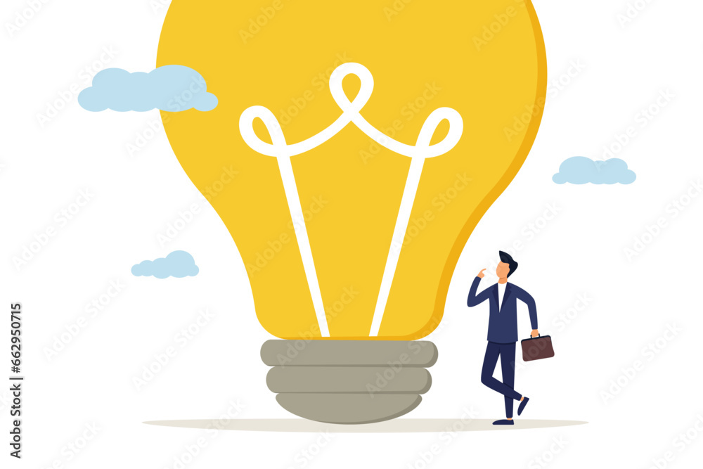 Smart businessman entrepreneur thinking with big light bulb. A big idea of creativity and imagination to overcome the concept of fear.