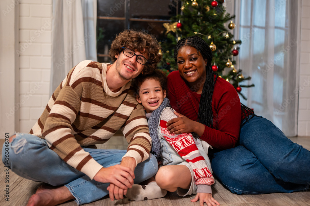 Portrait of Multi-ethnic family celebrate Christmas party in house.