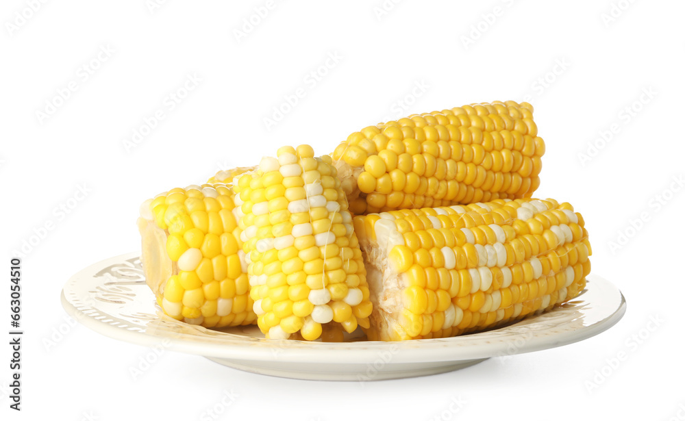 Plate with boiled corn cobs on white background