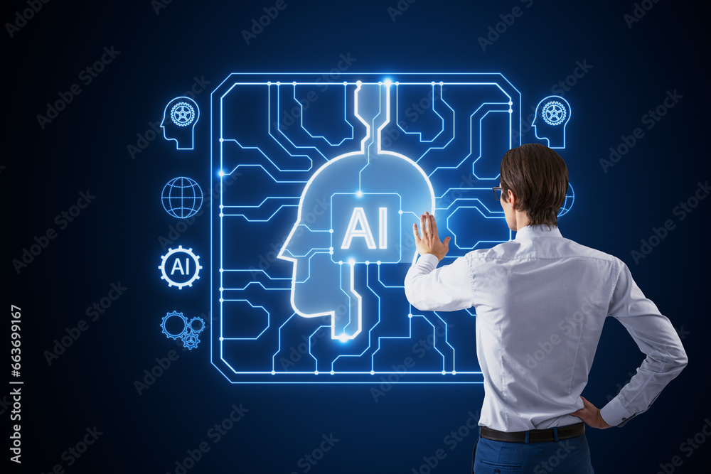 Back view of businessman using creative AI head outline hologram with circuit on blurry blue background.