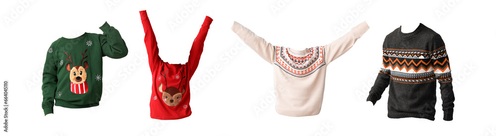 Set of stylish winter sweaters on white background