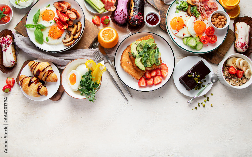 Healthy breakfast eating concept, various morning food on light background