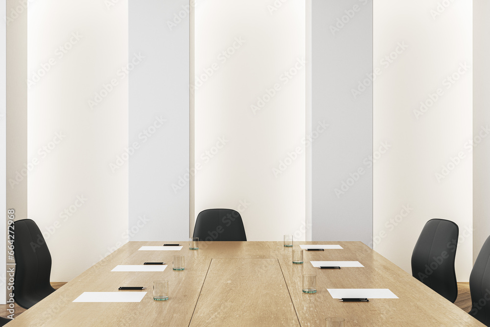 Close up of table in modern meeting room interior with light wall. 3D Rendering.