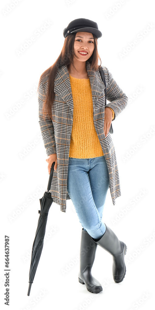 Beautiful young Asian woman with umbrella isolated on white background