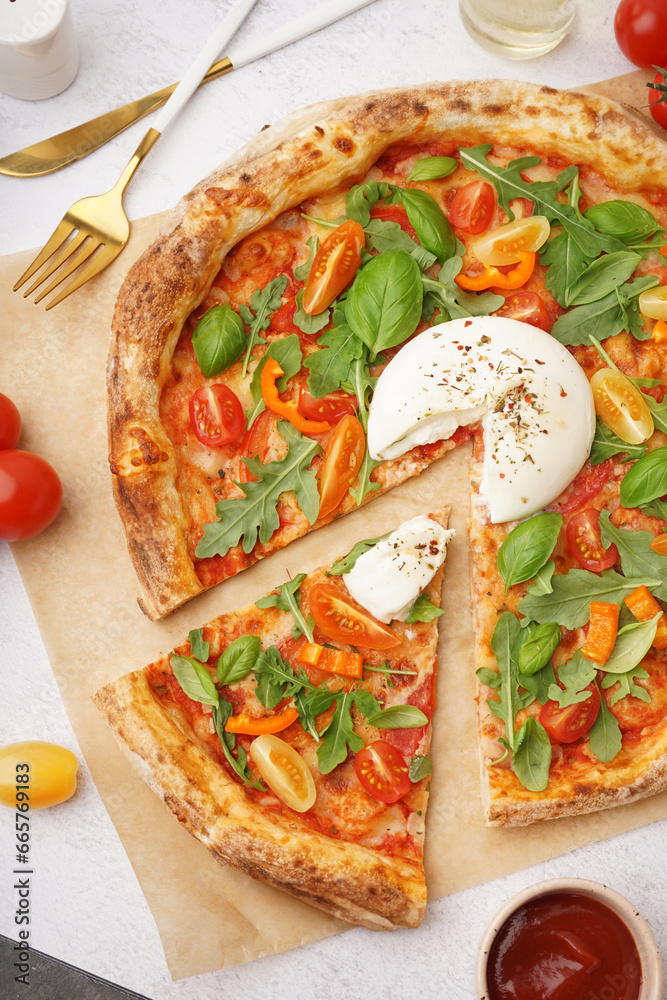 Tasty pizza with Burrata cheese on light background