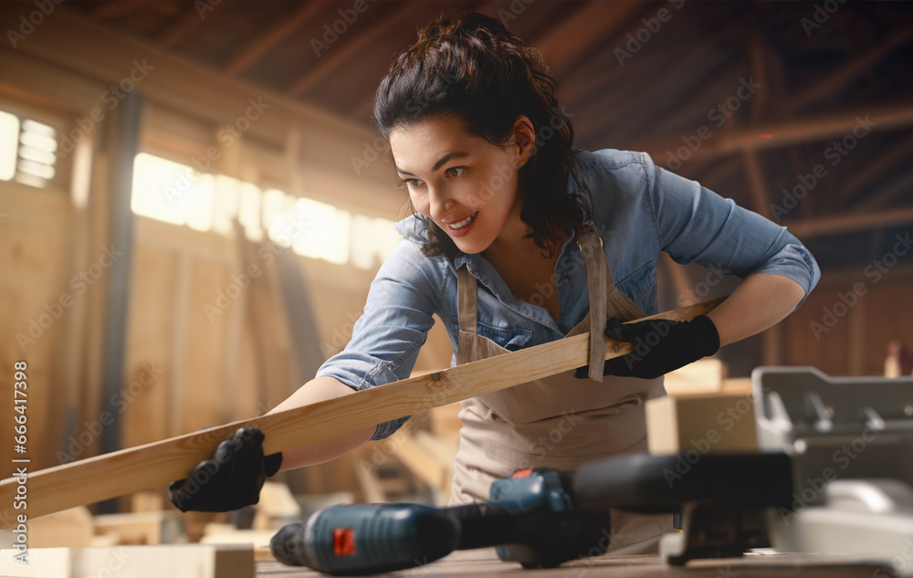 carpenter is working in workshop