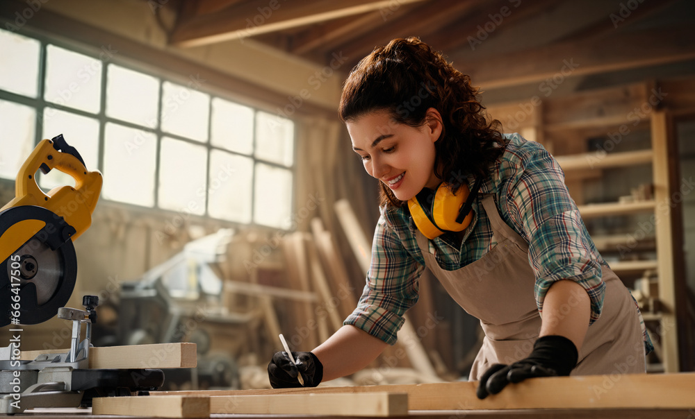 carpenter is working in workshop