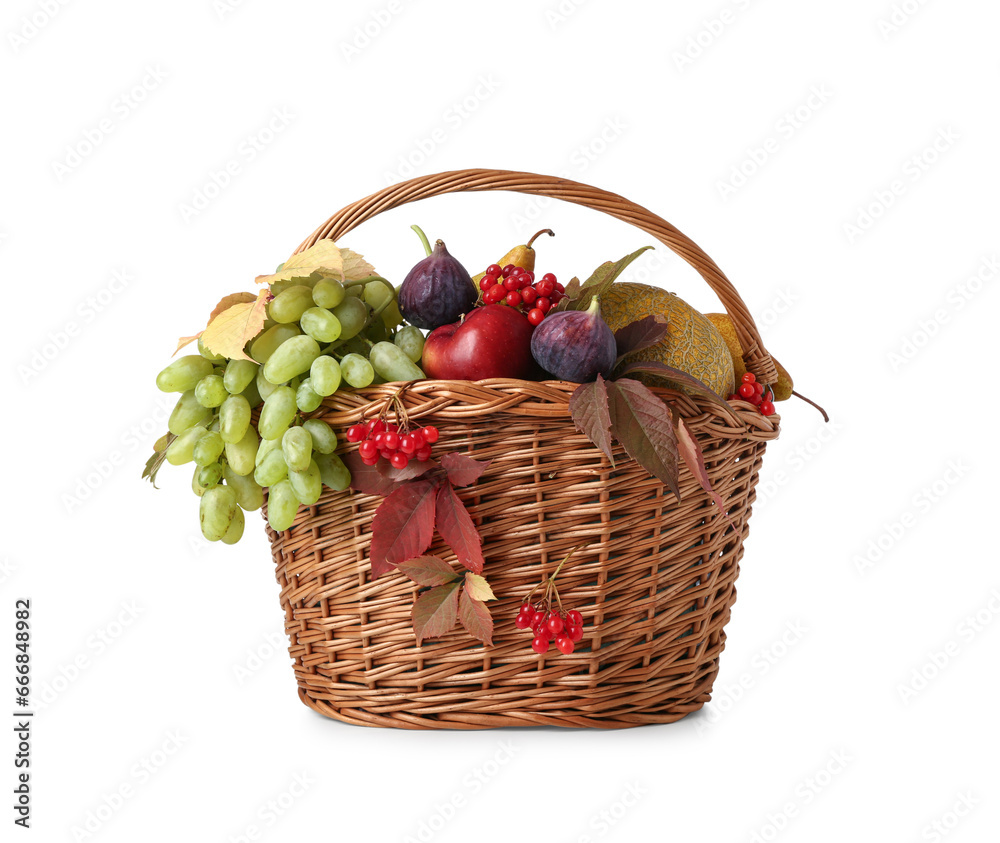 Wicker basket with different fresh fruits on white background