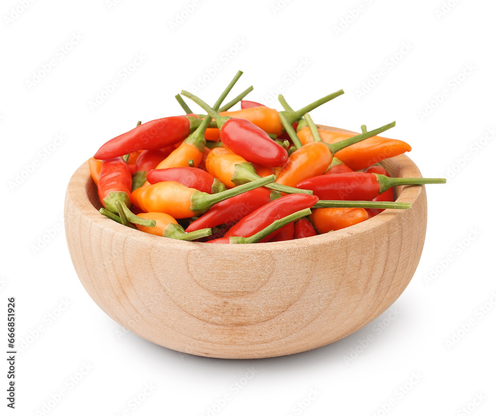 Wooden bowl with chili peppers on white background.