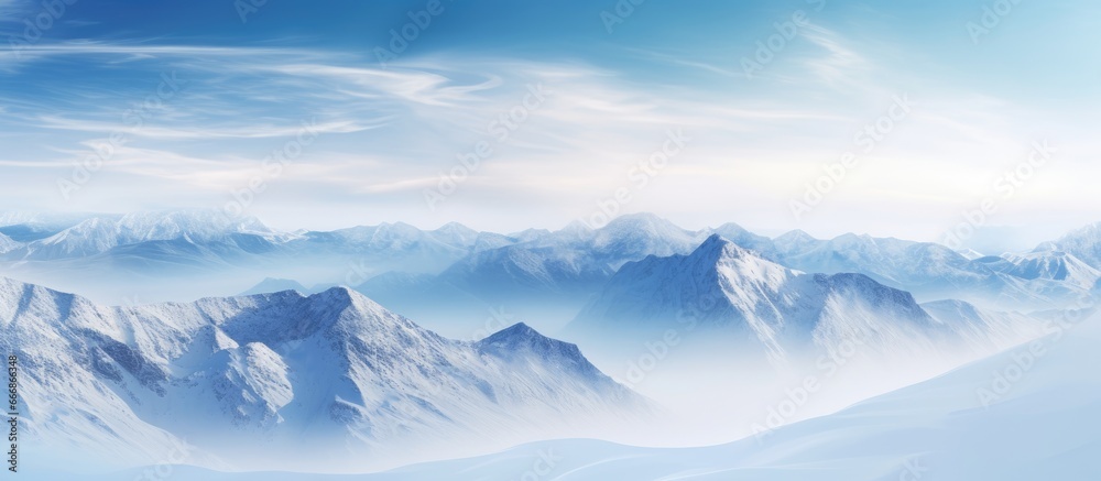 Cloudy sky over a wintery mountain scene