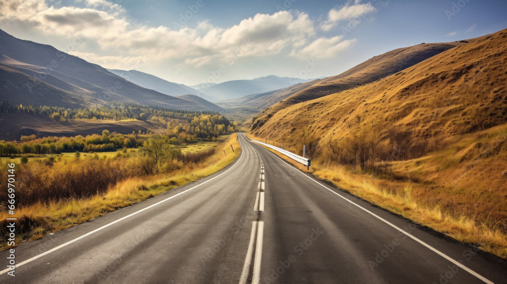 Road leading to autumn mountain scenery.