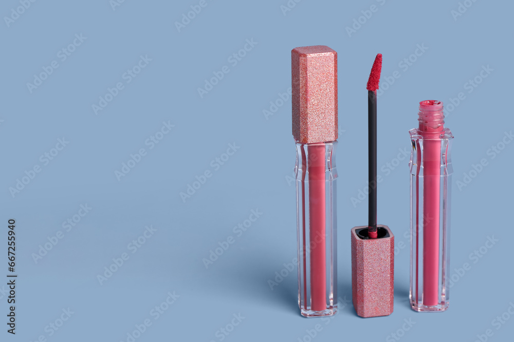 Liquid lipsticks on color background