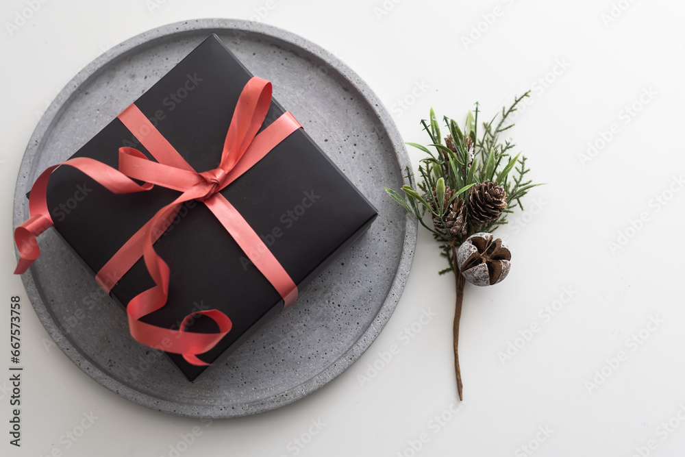 Christmas presents on round tray background