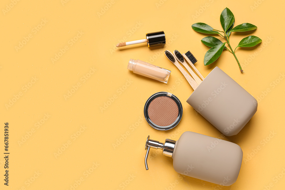 Composition with bath supplies and decorative cosmetics on color background