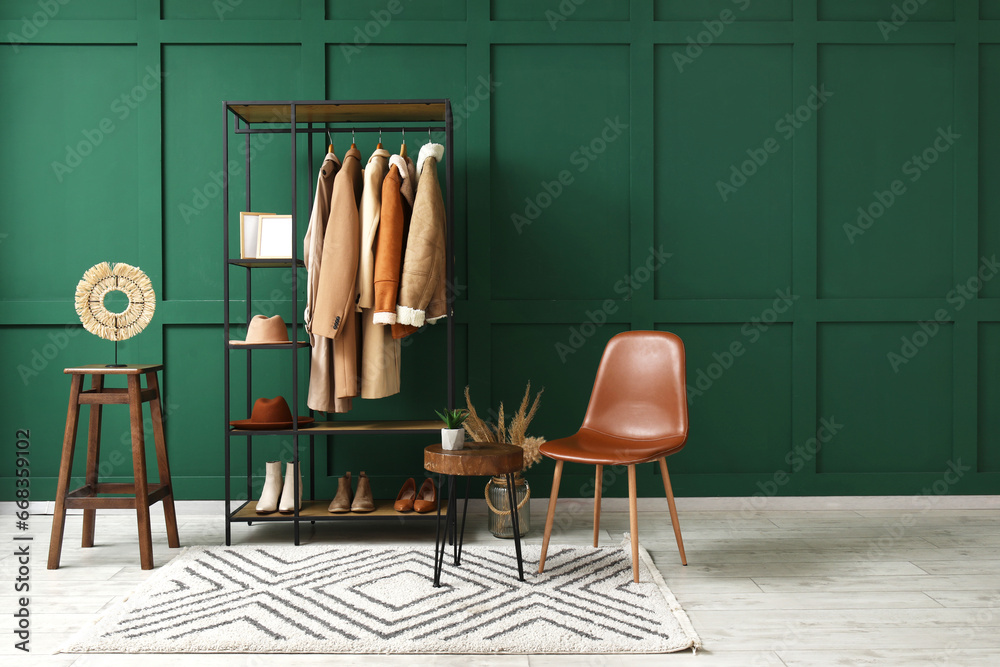 Interior of hall with coat rack and chair