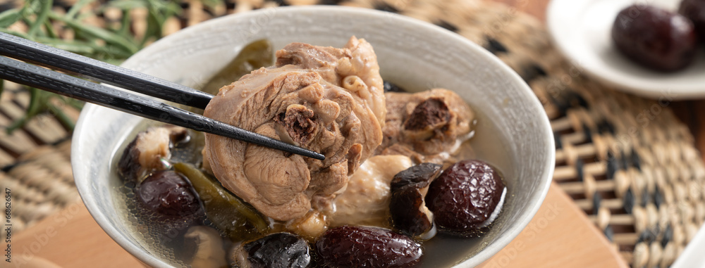 Delicious Taiwanese peeled green chili pepper chicken soup with mushroom